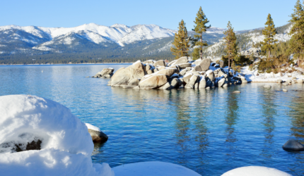 Lake Tahoe shoreline covered in snow